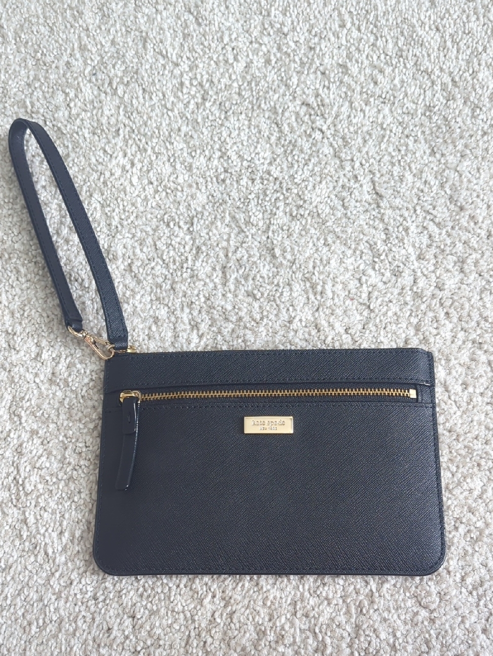 kate spade black leather wristlet with gold-tone zip and logo